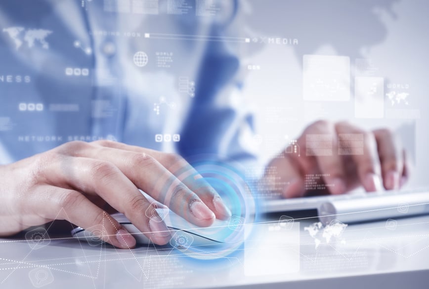 Hands of businessman working with keyboard and mouse