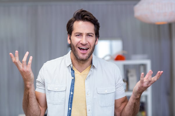 Portrait of confused man in clothing store