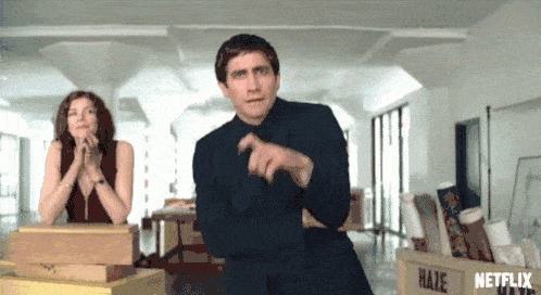Gif of Jake Gyllenhaal analyzing artwork in Velvet Buzzsaw