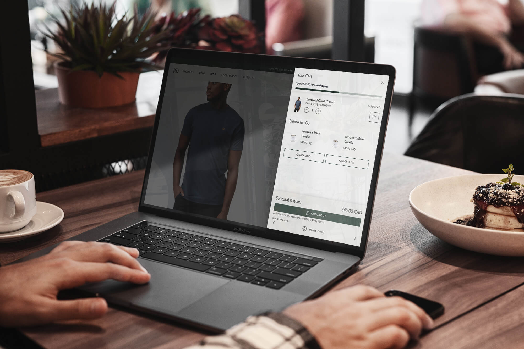 A customer discovers ecommerce personalization and while browsing personalized product recommendations on a laptop