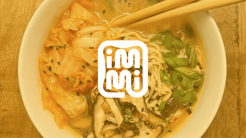 The immi logo super imposed over a picture of their delicious ramen